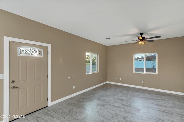 1153 Escorpion Ct, Rio Rico, AZ 85648 - unfurnished bedroom with baseboards, ceiling fan, and a closet