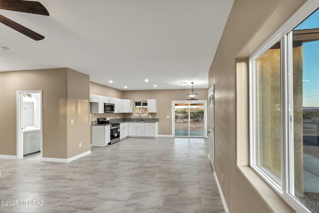 1153 Escorpion Ct, Rio Rico, AZ 85648 - clothes washing area featuring laundry area, visible vents, a glass covered fireplace, hookup for a washing machine, and gas dryer hookup