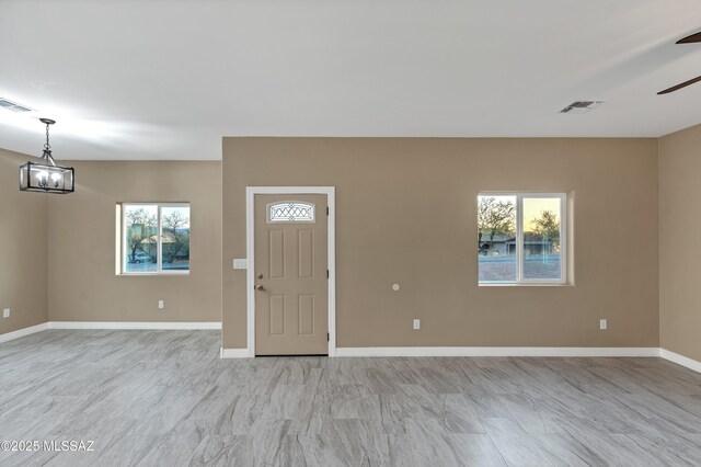 1153 Escorpion Ct, Rio Rico, AZ 85648 - unfurnished bedroom with baseboards, ceiling fan, and a closet
