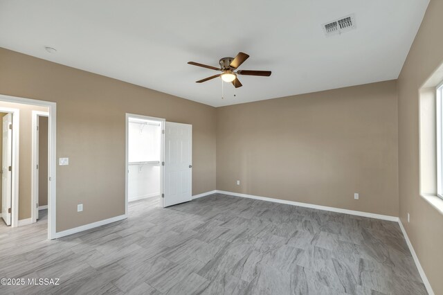 1153 Escorpion Ct, Rio Rico, AZ 85648 - kitchen with white cabinets, a sink, stainless steel appliances, baseboards, and recessed lighting