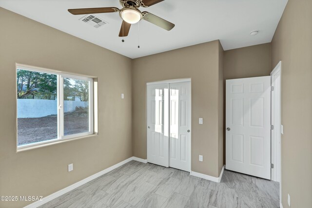 1153 Escorpion Ct, Rio Rico, AZ 85648 - unfurnished living room with baseboards, ceiling fan, and recessed lighting