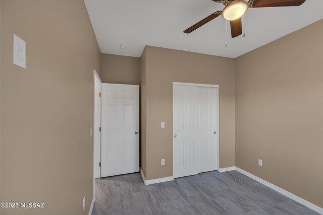 1153 Escorpion Ct, Rio Rico, AZ 85648 - unfurnished room with visible vents, a ceiling fan, and baseboards
