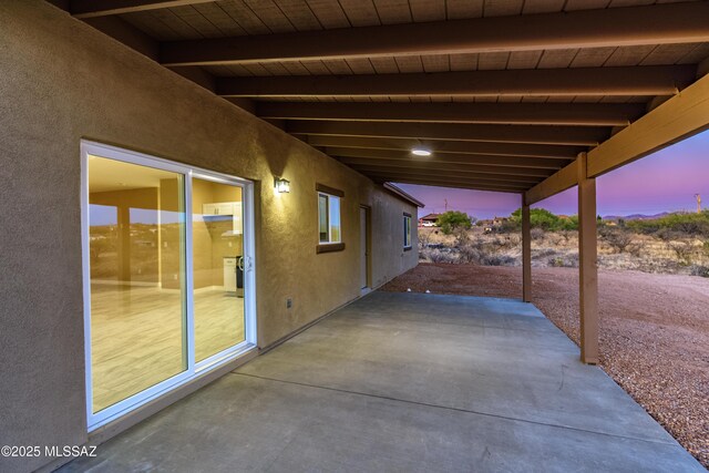 1153 Escorpion Ct, Rio Rico, AZ 85648 - view of patio terrace at dusk