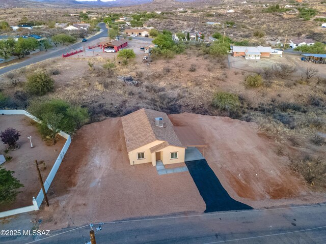 1153 Escorpion Ct, Rio Rico, AZ 85648 - aerial view at dusk with a mountain view