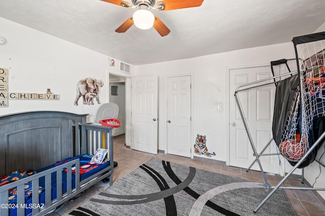 157 W Veterans Blvd, Tucson, AZ 85713 - bedroom featuring tile patterned flooring, ceiling fan, and visible vents