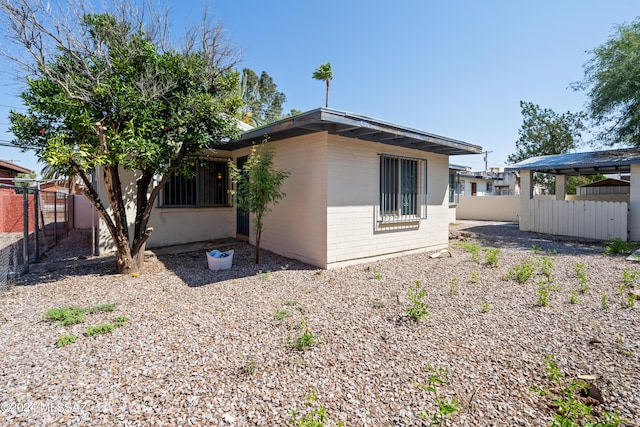 exterior space featuring fence