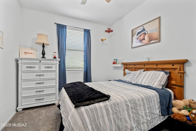bedroom with a ceiling fan, baseboards, and dark colored carpet