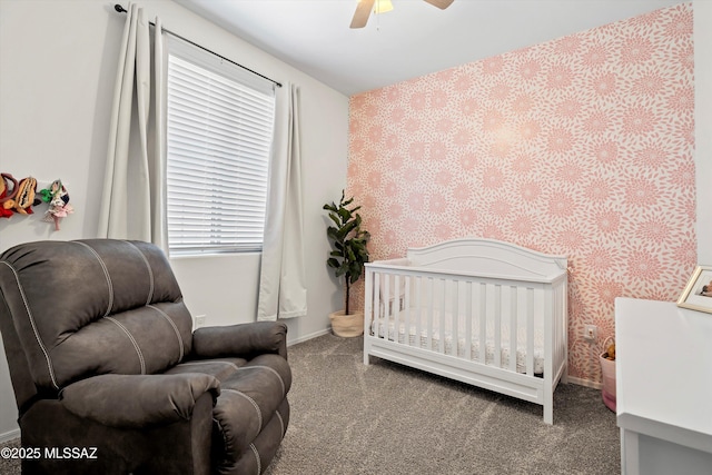 bedroom with carpet floors, ceiling fan, baseboards, and wallpapered walls
