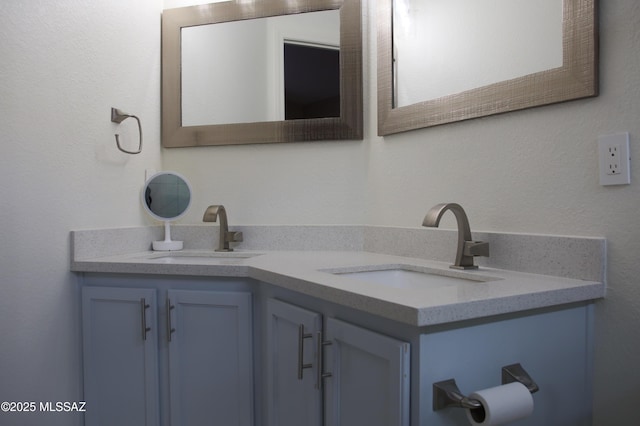 bathroom featuring double vanity