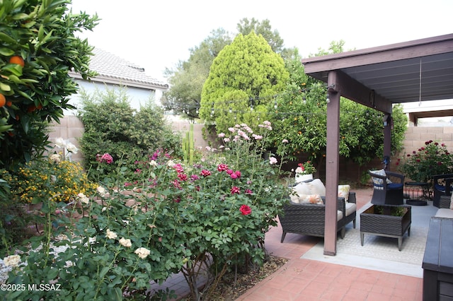view of patio / terrace with fence and outdoor lounge area