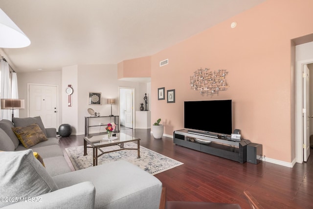 living area featuring wood finished floors and baseboards
