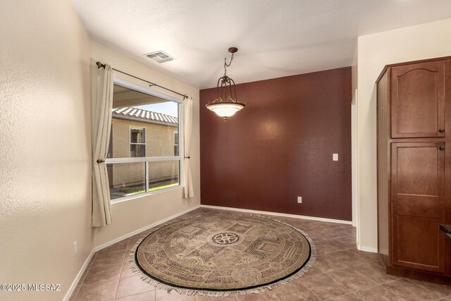 2436 E Desert Pueblo Pass, Green Valley, AZ 85614 - interior space with tile patterned floors, visible vents, and a healthy amount of sunlight