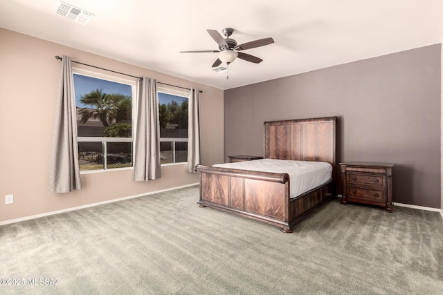 2436 E Desert Pueblo Pass, Green Valley, AZ 85614 - carpeted bedroom featuring visible vents, a ceiling fan, and baseboards