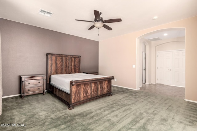 2436 E Desert Pueblo Pass, Green Valley, AZ 85614 - bedroom with visible vents, arched walkways, carpet, and baseboards