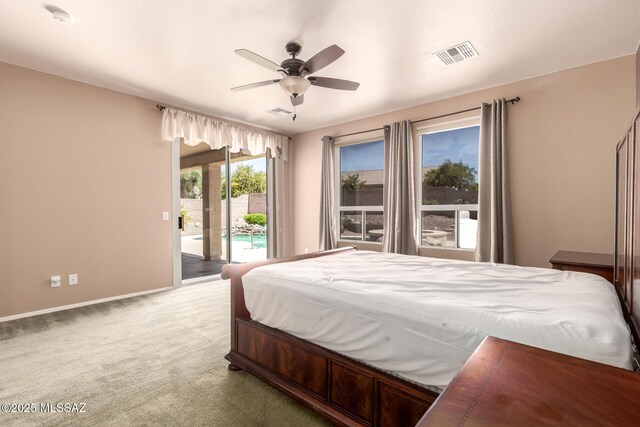 2436 E Desert Pueblo Pass, Green Valley, AZ 85614 - carpeted bedroom featuring access to outside, baseboards, visible vents, and ceiling fan