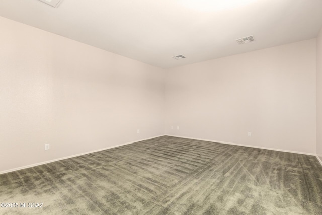 2436 E Desert Pueblo Pass, Green Valley, AZ 85614 - empty room with baseboards, visible vents, and dark colored carpet