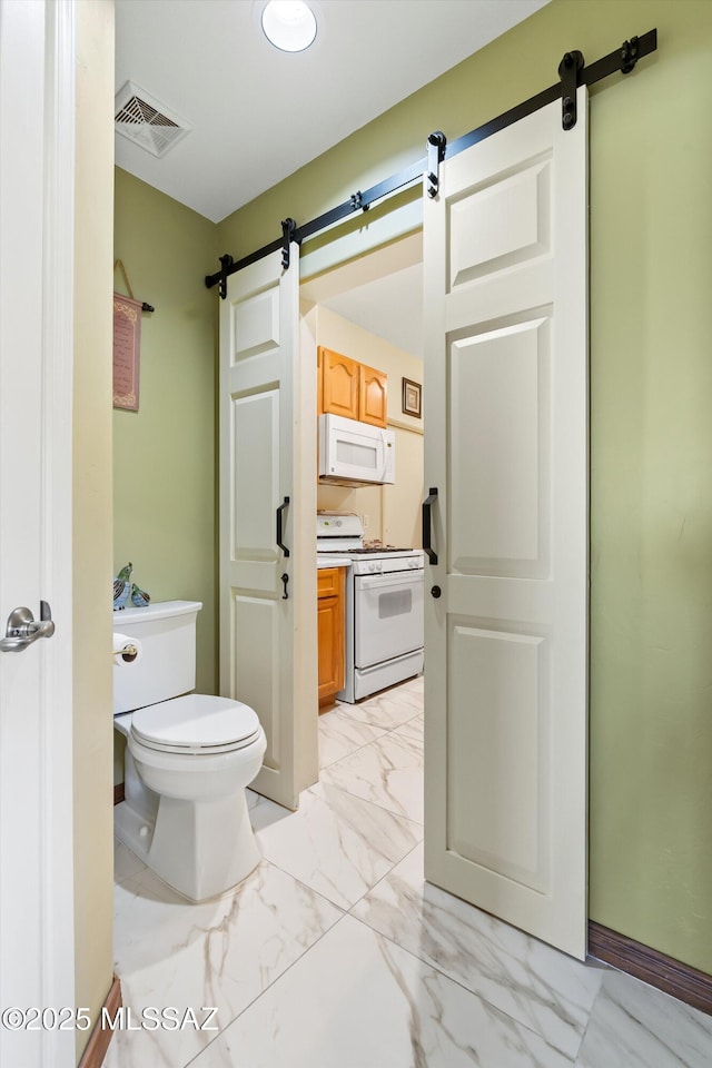 39930 S Mountain Shadow Dr, Tucson, AZ 85739 - bathroom with marble finish floors and toilet