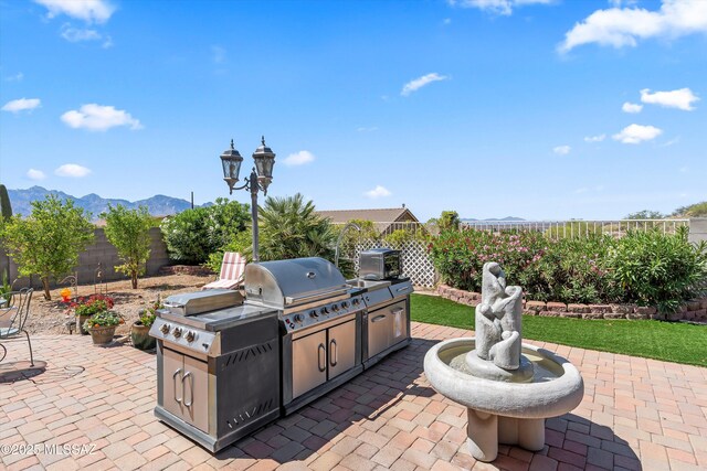 39930 S Mountain Shadow Dr, Tucson, AZ 85739 - fenced backyard featuring a mountain view and a patio