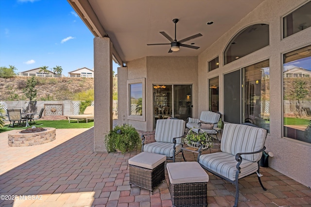 39930 S Mountain Shadow Dr, Tucson, AZ 85739 - view of patio featuring a fire pit and a ceiling fan