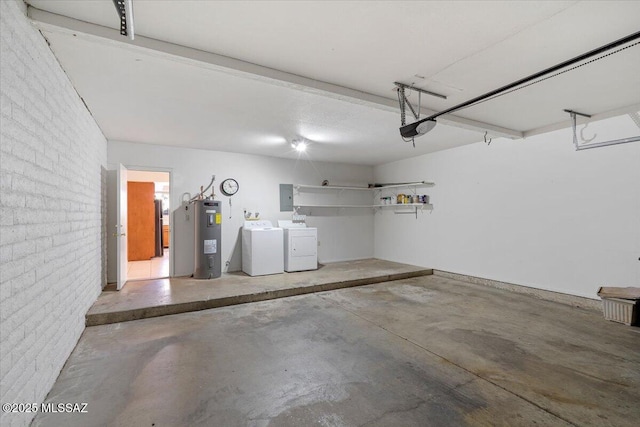 garage featuring a garage door opener, electric panel, independent washer and dryer, and water heater