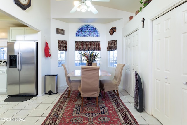 21 Kachina, Rio Rico, AZ 85648 - dining room with light tile patterned flooring, a ceiling fan, vaulted ceiling, and plenty of natural light