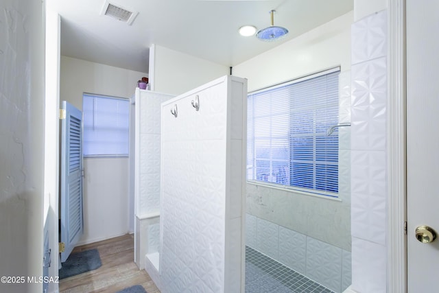 21 Kachina, Rio Rico, AZ 85648 - full bath with visible vents, a walk in shower, and wood finished floors