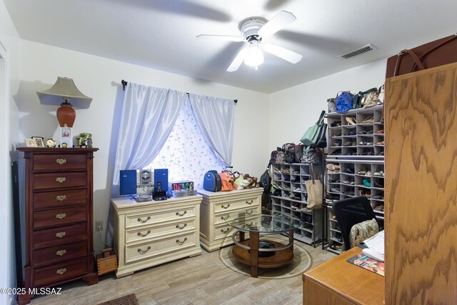 21 Kachina, Rio Rico, AZ 85648 - interior space with visible vents, light wood-style floors, and ceiling fan