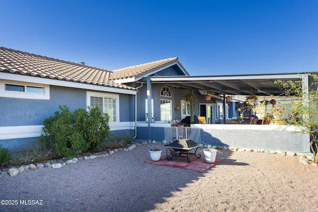 21 Kachina, Rio Rico, AZ 85648 - rear view of house featuring stucco siding and a tile roof