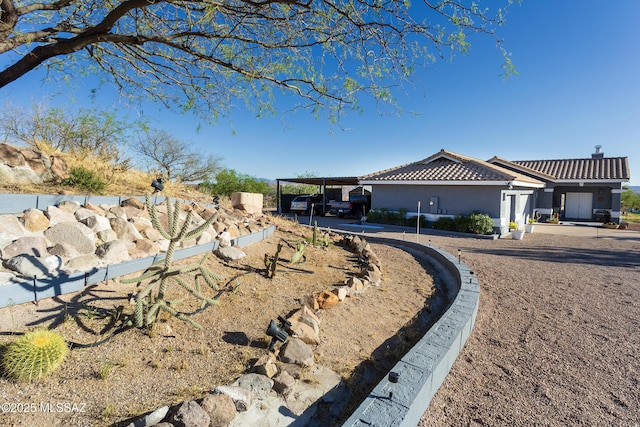 21 Kachina, Rio Rico, AZ 85648 - exterior space featuring stucco siding and a tiled roof