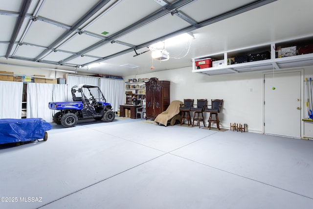 21 Kachina, Rio Rico, AZ 85648 - garage featuring a garage door opener