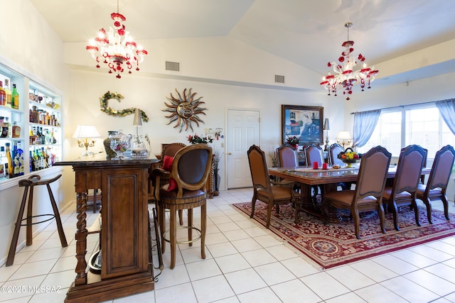 21 Kachina, Rio Rico, AZ 85648 - dining area with vaulted ceiling, light tile patterned flooring, a chandelier, and visible vents