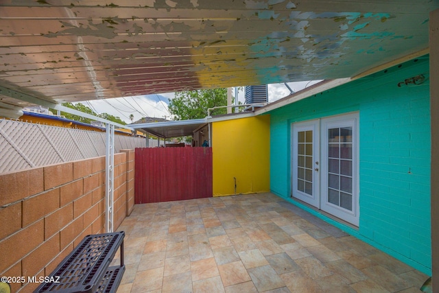 390 N Silverbell Rd, Tucson, AZ 85745 - view of patio / terrace with french doors and fence