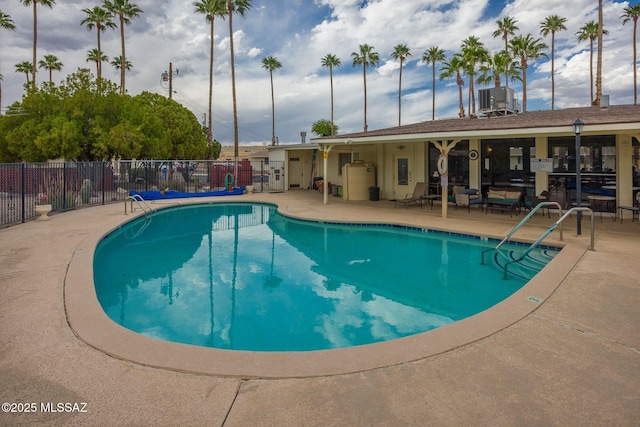 390 N Silverbell Rd, Tucson, AZ 85745 - community pool featuring a patio and fence