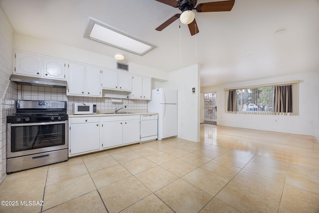 390 N Silverbell Rd, Tucson, AZ 85745 - kitchen with white appliances, under cabinet range hood, a sink, ceiling fan, and light tile patterned flooring