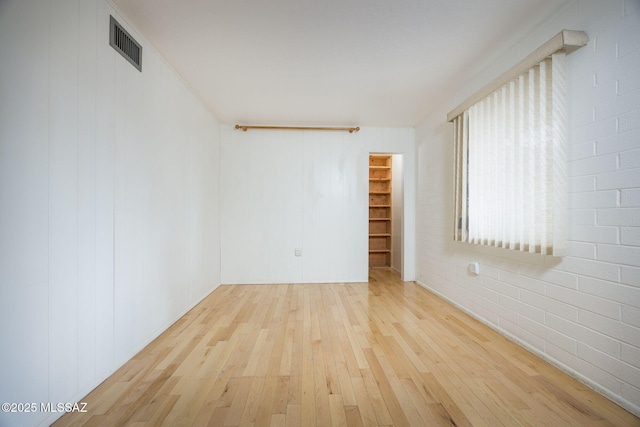 390 N Silverbell Rd, Tucson, AZ 85745 - unfurnished room with hardwood / wood-style floors