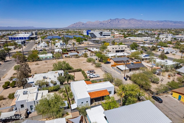 birds eye view of property featuring a mountain view and a residential view