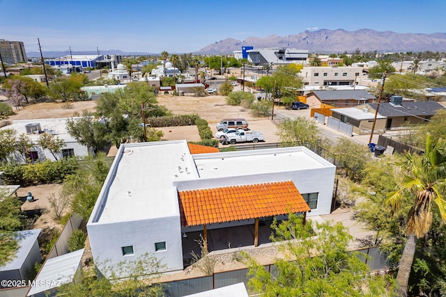 birds eye view of property with a residential view and a mountain view