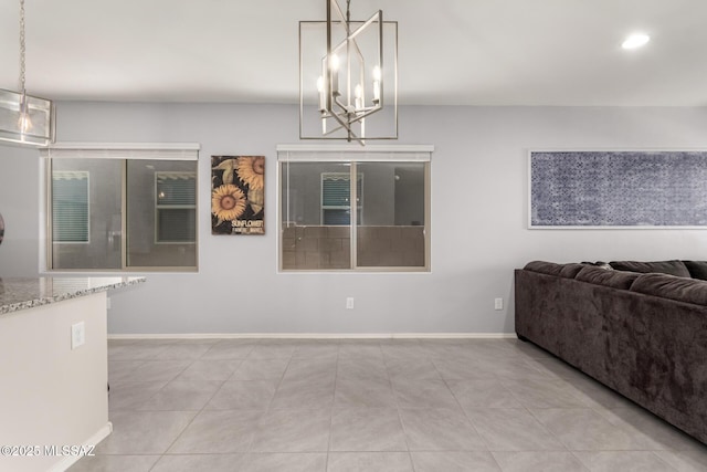 7688 S Via Perfecta, Tucson, AZ 85756 - tiled living area featuring baseboards, a chandelier, and recessed lighting