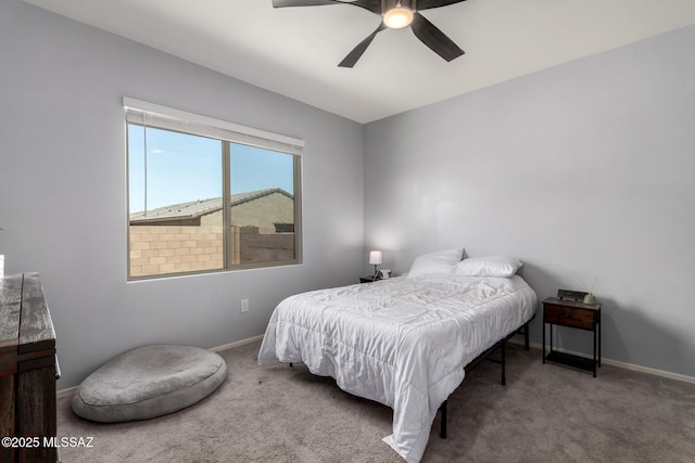 7688 S Via Perfecta, Tucson, AZ 85756 - carpeted bedroom with baseboards and a ceiling fan