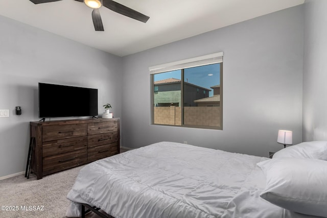 7688 S Via Perfecta, Tucson, AZ 85756 - carpeted bedroom with ceiling fan and baseboards