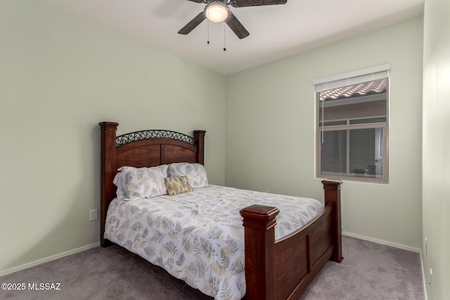 7688 S Via Perfecta, Tucson, AZ 85756 - bedroom with carpet flooring, baseboards, and a ceiling fan