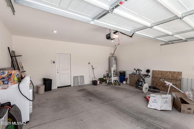 7688 S Via Perfecta, Tucson, AZ 85756 - garage with gas water heater, a garage door opener, and washer / dryer
