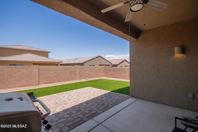 7688 S Via Perfecta, Tucson, AZ 85756 - fenced backyard featuring ceiling fan and a patio area