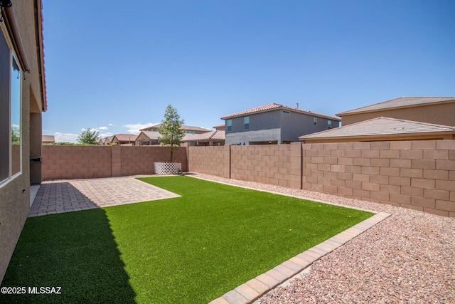 7688 S Via Perfecta, Tucson, AZ 85756 - view of yard with a patio