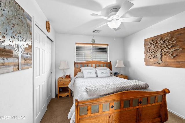 carpeted bedroom with a ceiling fan, baseboards, visible vents, and a closet