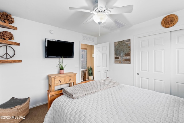 bedroom featuring baseboards, ceiling fan, carpet floors, and visible vents