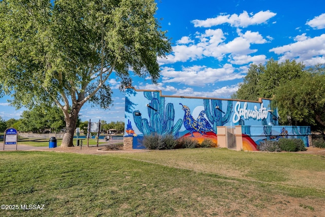 surrounding community with a yard