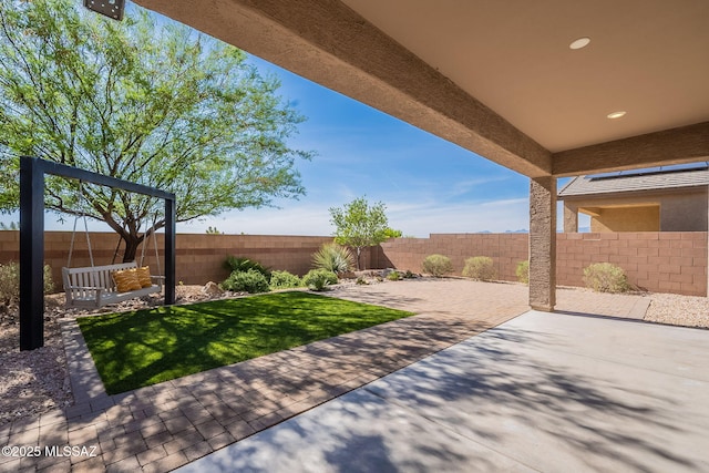 view of patio with a fenced backyard