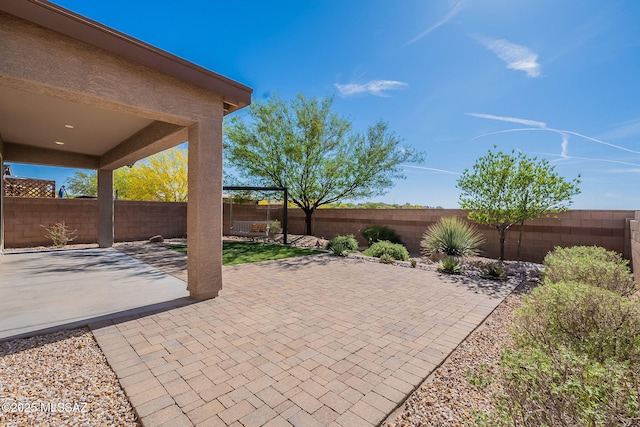view of patio featuring a fenced backyard