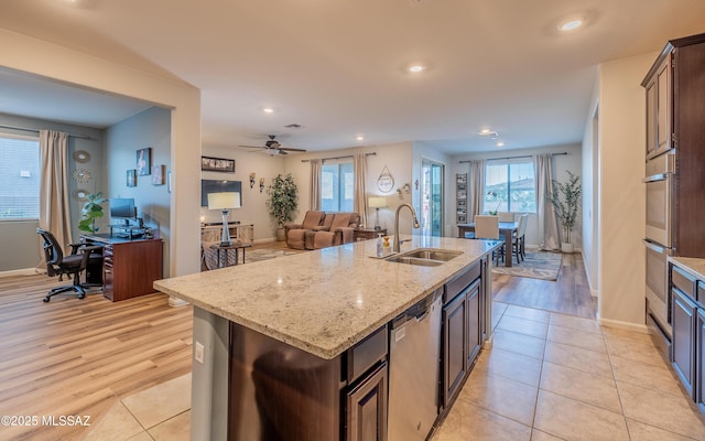 10199 S Pantano Knolls Dr, Vail, AZ 85641 - kitchen featuring baseboards, a sink, recessed lighting, and stainless steel appliances